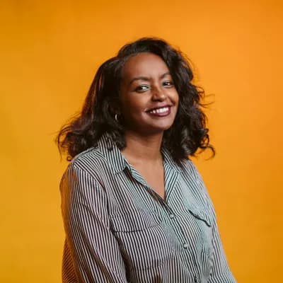 Smiling woman with curly hair