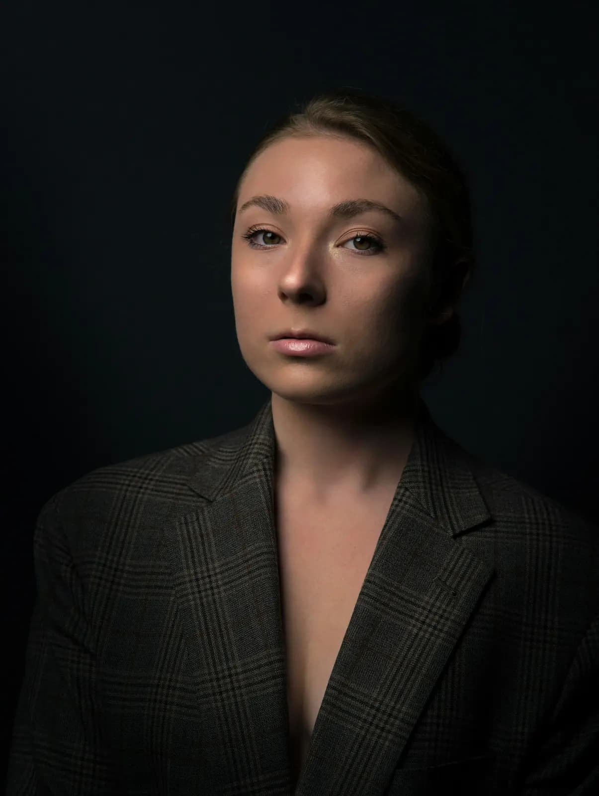 Portrait of a businesswoman in a dark blazer