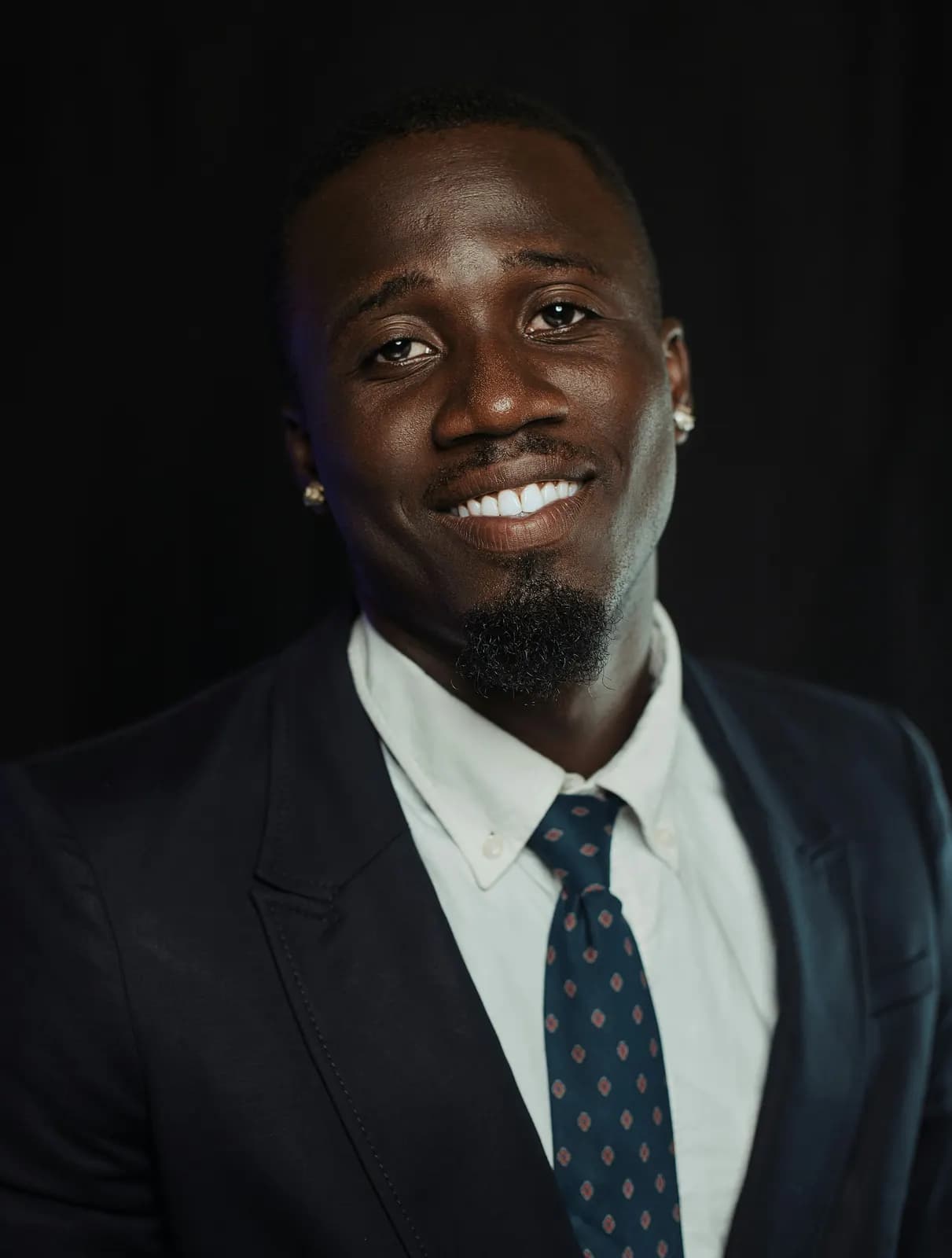 Portrait of a smiling businessman in a suit and tie